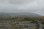 Karst pavements and topography of the Burren approx 5km south of Ballyvaughan Co Clare Ireland. Exposures of the Dinantian Burren Limestone Formation are composed of shallow water carbonates. Note the clints (limestone blocks) and grikes (joints formed by Variscan folding (Coller, 1984) and fracturing) enlarged by Pleistocene disolution (Williams, 1966).